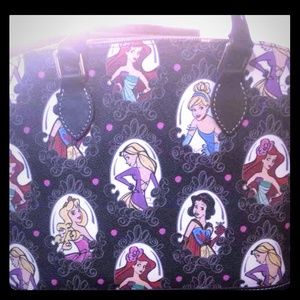 ISO Dooney & Burke Disneyland collection