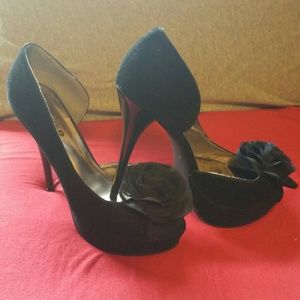 Black heels with flower accent