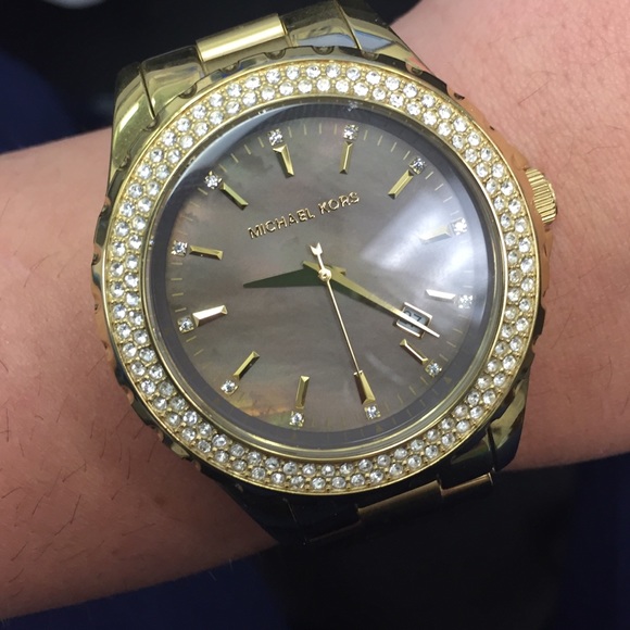 Practically brand new Michael Kors gold watch,