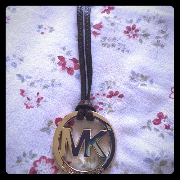 Michael kors Gold charm with dark brown leather