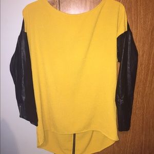 Yellow and black with fake leather. TAGS STILL ON!