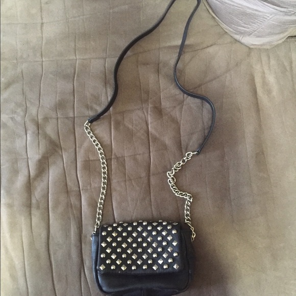 Steve Madden black studded crossbody handbag.