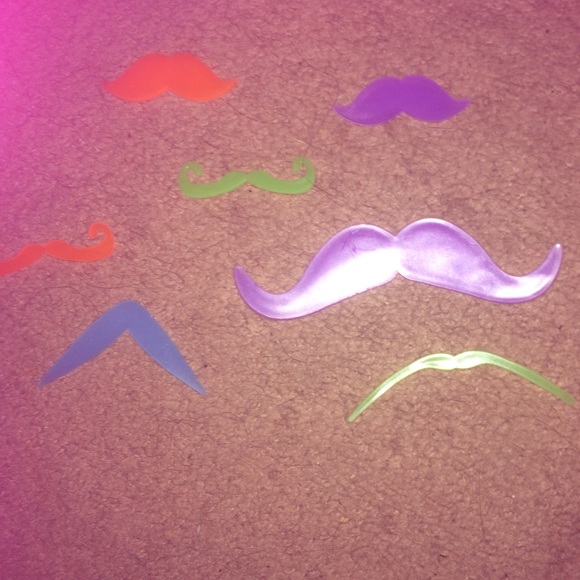 Set of seven glow in the dark moustache mounts