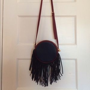 Round fringe bag by Deux Lux