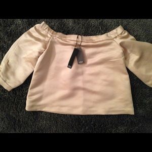Tibi top with tags attached