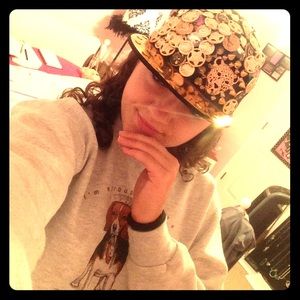 Black snap back hat with gold