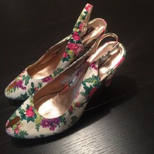 Material Girl floral peep toe pumps.