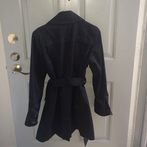 Black trench coat. only wore a few times. Lined.