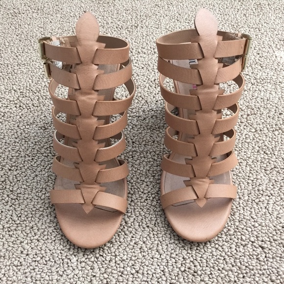 Tan gladiator heel sandals.