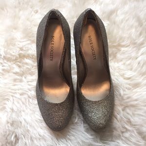 Glitzy round toe heels.
