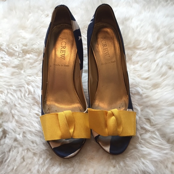 Silk navy print peep toe heels.