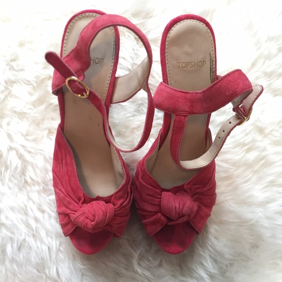 Red peep toe platform heels.