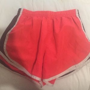 Orange Nike shorts