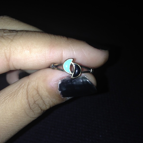 Blue and black moon shaped ring