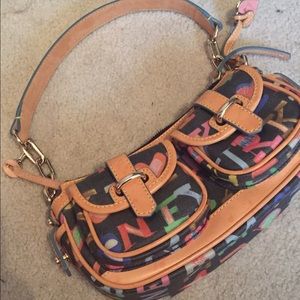 Small designer Dooney & Bourke hand bag.