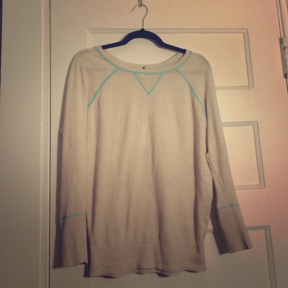 Awesome sweater with cool detailing in the back!