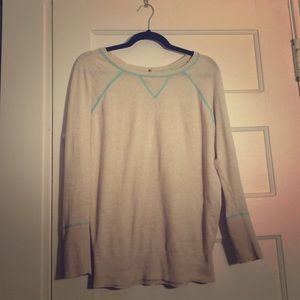 Awesome sweater with cool detailing in the back!