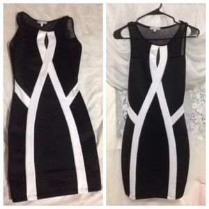 Black body con dress with white design