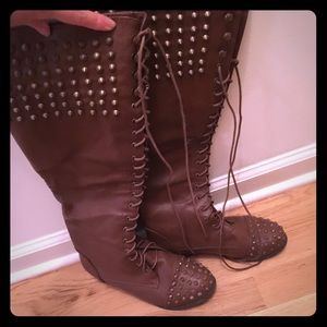 Lace up brown knee boots with studs