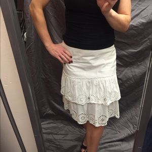 White tiered skirt with jewel embellishment