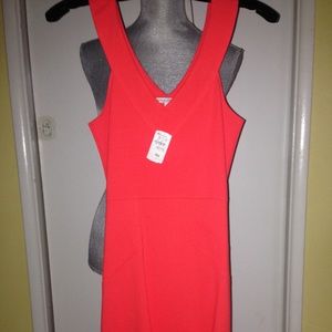 Amanda Uprichard bright orange/pink dress.