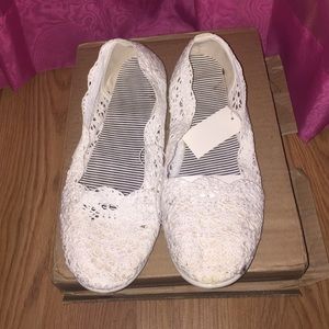 White slip on shoes