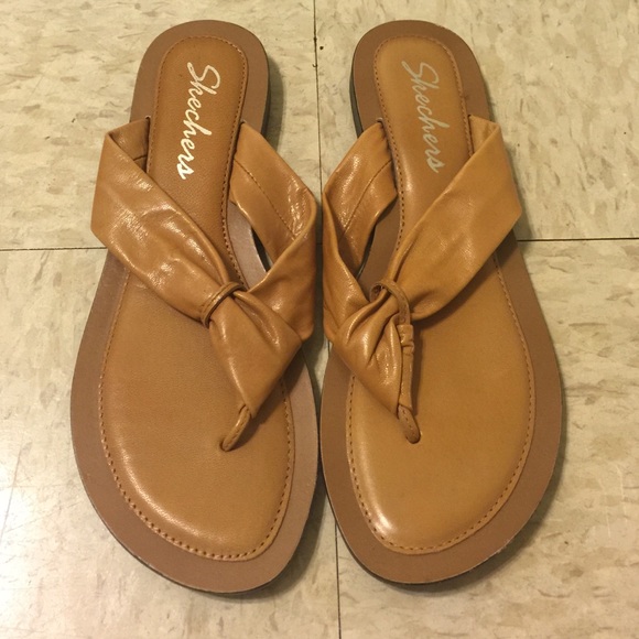 Tan sketchers slippers