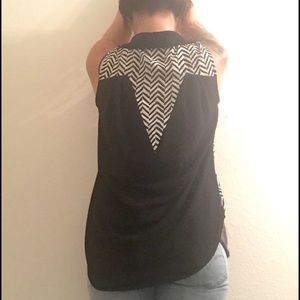 Black and white sleeveless blouse