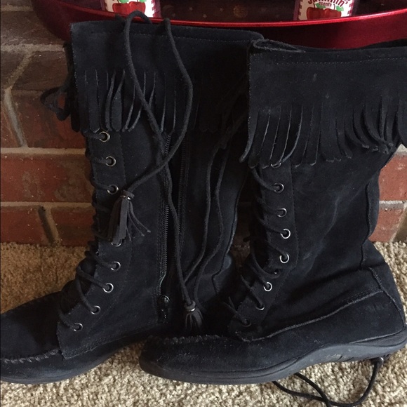 Black boots with fringe