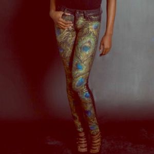 Metallic peacock hand painted on jeans
