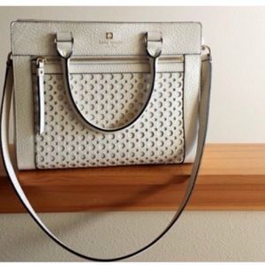 Kate Spade ( HOLDING)