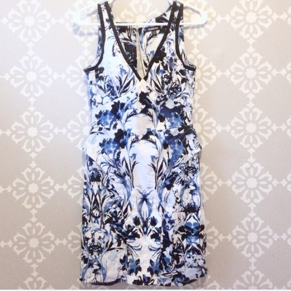 💥Lowest Price! - Bebe Peplum floral dress💥