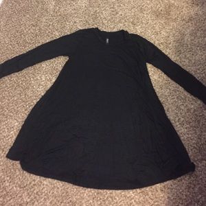 Black, long sleeved dress. Never worn.