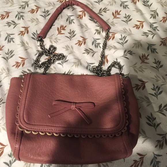 Urban Outfitters Handbags - Urban outfitters long strap bag with bow.