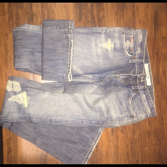 Distressed boot cut jeans