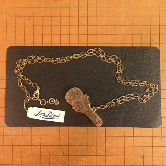 Lucky Brand gold 18" chain with guitar locket.