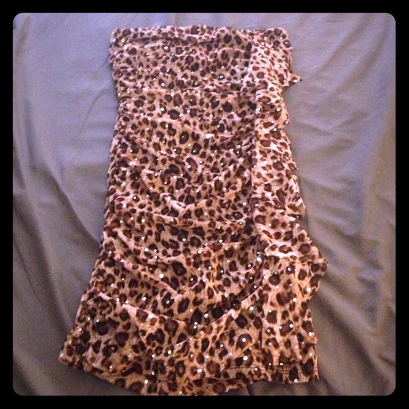 Fitting cheetah print dress with sequins.