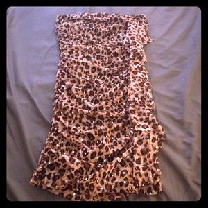 Fitting cheetah print dress with sequins.