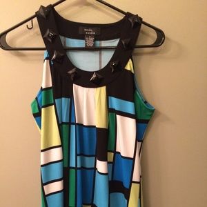 Cute, color blocked top with embellishments