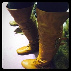 Over the knee riding boots