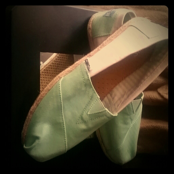 TOMS Green and White slip on shoes