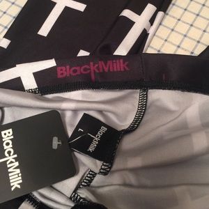 BlackMilk LARGE cross leggings. NWT!!