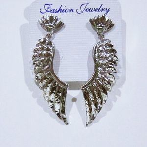 10 / $10 - Silver wings retro earrings