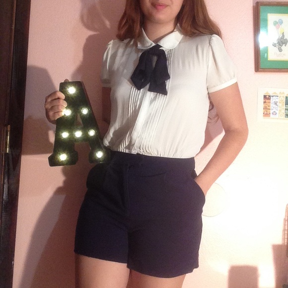 Adorable Navy button up romper.