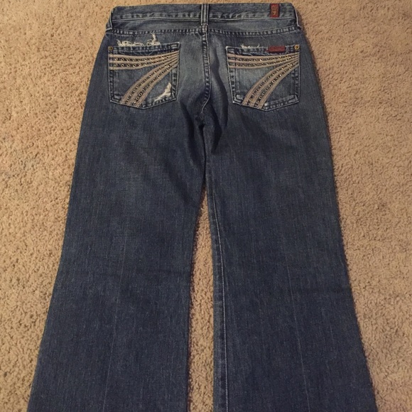 jeans with 7 detail on back pockets. Worn once