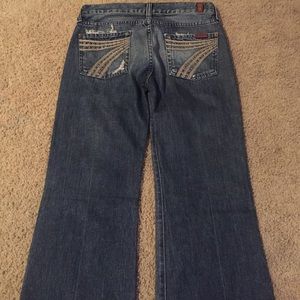 jeans with 7 detail on back pockets. Worn once