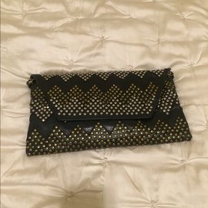 Studded sensation cross body or clutch!