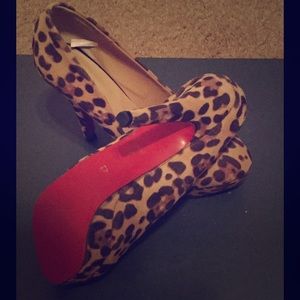 Leopard print platform heels with red bottoms