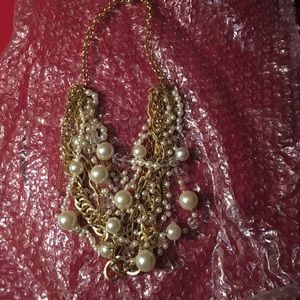 Gold chain and pear necklace
