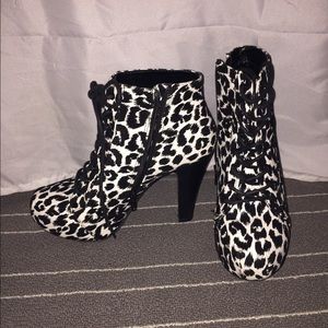 White leopard print heeled boots